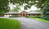 SPRAWLING BUNGALOW IN PRESTIGIOUS WOODLAND ACRES ESTATE