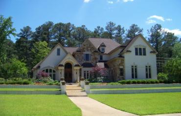 OWN THE LARGEST HOME IN THE AREA. NEWER 2-STORY WITH FULL GUESTHOUSE