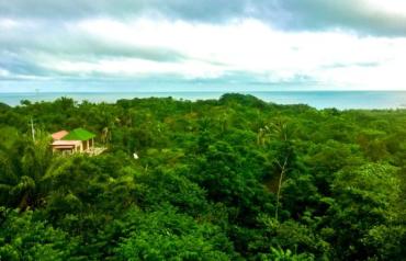 2.5 acres with panoramic ocean and mountain views in tourism hotspot