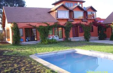 Land and house  (Parcela)