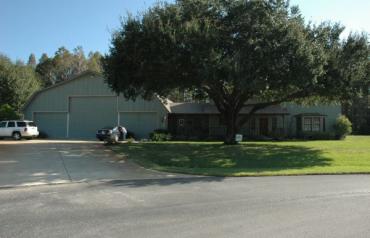 Airport Community Custom Home with Hangar and Solar Heated Pool