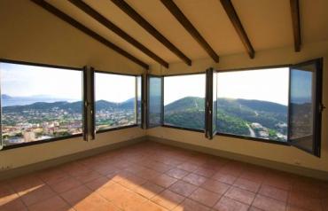 A three level house waits for its first owners to pronounce it a home.