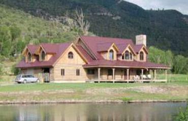 Scenic Geothermal Hot Springs Property, Log Home, Stunning Views