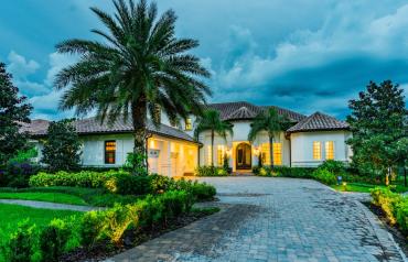 One of a Kind Lake and Golf Front Custom Home